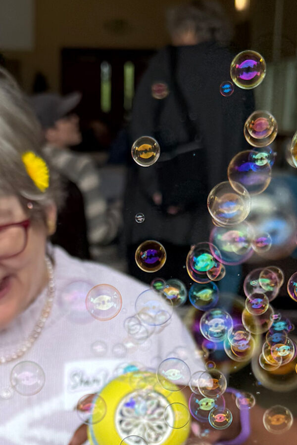 Sharilynn and Irene blowing bubbles