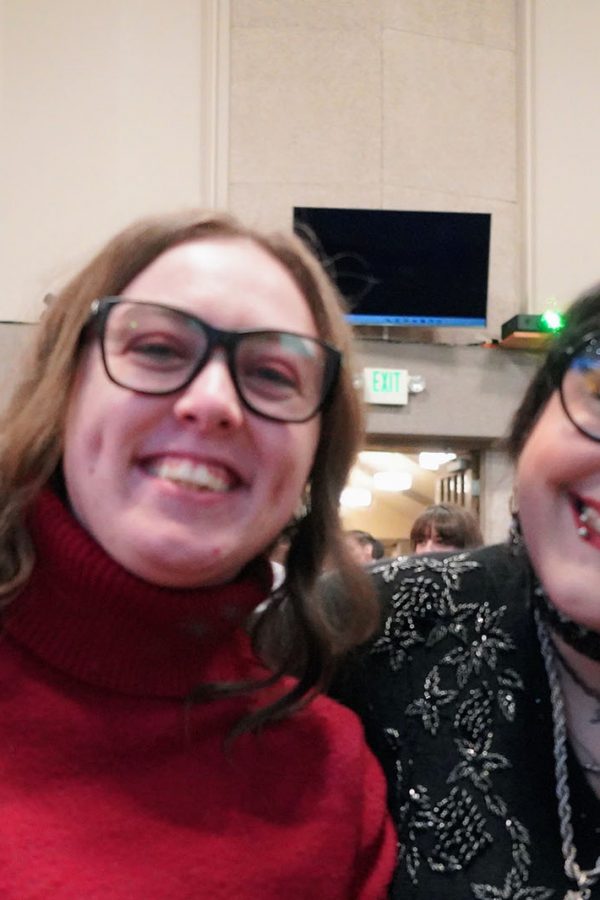 two women smiling together